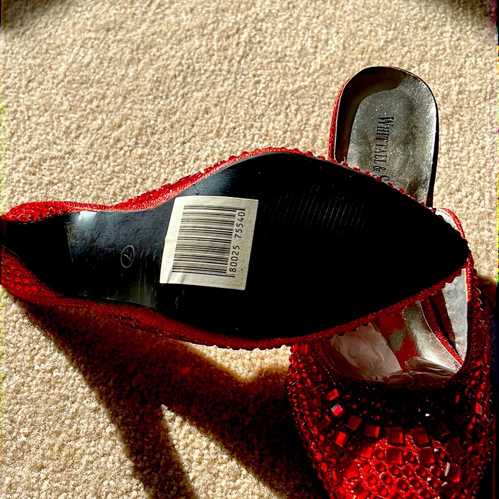 It’s a beautiful red slide on sequence shoe